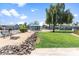 Well-maintained community space offering lawn games and benches surrounded by landscaping at 535 S Alma School Rd # 17, Mesa, AZ 85210