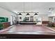 Community game room with pool tables, comfortable seating, and ample space for social gatherings at 535 S Alma School Rd # 17, Mesa, AZ 85210
