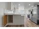 Bright kitchen features stainless steel appliances, white cabinetry, and stylish countertops at 535 S Alma School Rd # 17, Mesa, AZ 85210