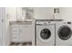Convenient laundry area with washer, dryer, sink, and storage at 535 S Alma School Rd # 17, Mesa, AZ 85210