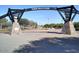 Daytime view of Tempe Beach Park entrance, featuring stone pillars and an open, inviting landscape at 535 S Alma School Rd # 17, Mesa, AZ 85210