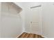 Walk-in closet with single shelf and bar for hanging clothes at 6103 S 54Th Ave, Laveen, AZ 85339