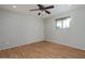 Bedroom featuring hardwood floors and a window offering natural light, creating a warm and inviting space at 6408 E Gary Rd, Scottsdale, AZ 85254