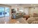 Cozy living room with comfortable seating, a modern rug, and access to the outdoor patio at 6408 E Gary Rd, Scottsdale, AZ 85254