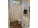 Bathroom featuring a shower-tub combo, and a single sink vanity with white cabinets at 6873 S Lake Forest Ct, Chandler, AZ 85249