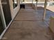 Spacious covered patio with concrete flooring, perfect for outdoor relaxation and entertaining at 6873 S Lake Forest Ct, Chandler, AZ 85249