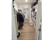 Spacious walk-in closet with built-in shelving and ample storage space at 6873 S Lake Forest Ct, Chandler, AZ 85249