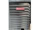 Close-up of the Goodman air conditioner unit at 7046 N 84Th Dr, Glendale, AZ 85305