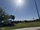 Community park with green grass, walking path, gazebo and lush landscaping at 7046 N 84Th Dr, Glendale, AZ 85305