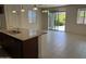 The dining area features a window and a sliding door that leads to the back yard at 7046 N 84Th Dr, Glendale, AZ 85305