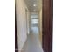 A tiled entrance that is brightly lit leading into a large open room at 7046 N 84Th Dr, Glendale, AZ 85305