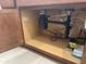 The space under the sink features the garbage disposal and cleaning supplies at 7046 N 84Th Dr, Glendale, AZ 85305