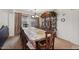 Formal dining room with elegant wooden furniture and ample space for gatherings at 7309 W Getty Dr, Phoenix, AZ 85043