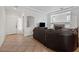 Bright living room with tile floors, a cozy fireplace, and ample natural light at 7309 W Getty Dr, Phoenix, AZ 85043