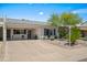 Charming single-story home featuring a low-maintenance desert landscape and covered parking at 7630 E Pasadena Ave, Scottsdale, AZ 85250