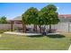 Lush green lawn featuring shaded gazebos, perfect for outdoor gatherings and relaxation at 7630 E Pasadena Ave, Scottsdale, AZ 85250