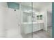 Bathroom featuring double vanity, frameless glass shower door, and modern fixtures, creating a spa-like experience at 7824 S 33Rd Ln, Laveen, AZ 85339