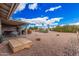 This house has a spacious backyard with desert landscaping, a covered patio and plenty of open space at 8248 E Emelita Ave, Mesa, AZ 85208