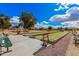 Well-maintained bocce ball court with green turf and benches, providing a relaxing recreational space at 8248 E Emelita Ave, Mesa, AZ 85208