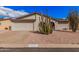 Charming single-story home with desert landscaping and attached two-car garage at 8248 E Emelita Ave, Mesa, AZ 85208