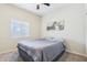 Bedroom with a bed, carpet and a motorcycle picture hanging on the wall at 10138 W Oregon Ave, Glendale, AZ 85307