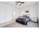 Cozy bedroom with soft carpet, neutral walls, and a comfortable bed, creating a relaxing retreat at 10138 W Oregon Ave, Glendale, AZ 85307