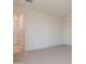 Neutral bedroom with ensuite bathroom that features a frameless glass shower at 11300 N Casa Dega Dr # 1090, Surprise, AZ 85388
