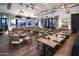 Beautiful dining room with lots of tables, chairs, and natural light with views at 11300 N Casa Dega Dr # 1090, Surprise, AZ 85388