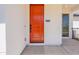 Close-up of a striking modern front door with a visible address and modern design at 11300 N Casa Dega Dr # 1090, Surprise, AZ 85388