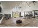 Bright gym boasts high ceilings, fitness equipment, and an open-air concept with views of the green outdoor space at 11300 N Casa Dega Dr # 1090, Surprise, AZ 85388