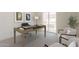 Bright home office with a modern desk, comfortable seating, and natural light at 11300 N Casa Dega Dr # 1090, Surprise, AZ 85388