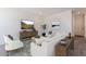 Bright living room featuring neutral decor, modern furniture, and hardwood floors at 11300 N Casa Dega Dr # 1090, Surprise, AZ 85388