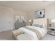 Serene main bedroom featuring neutral tones, a comfortable bed, and stylish furnishings at 11300 N Casa Dega Dr # 1090, Surprise, AZ 85388