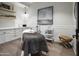 Well-appointed spa room featuring wood floors, sleek cabinets, shelving, and modern equipment at 11300 N Casa Dega Dr # 1090, Surprise, AZ 85388