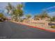 Community entrance featuring a desert landscape and signage for 'Mirage Crossing' at 11500 E Cochise Dr # 2088, Scottsdale, AZ 85259