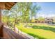 A green space and walking path is viewable from this angle of the home's exterior at 11500 E Cochise Dr # 2088, Scottsdale, AZ 85259