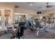 Bright and airy gym with modern exercise equipment, mirrored walls, and ample workout space at 11500 E Cochise Dr # 2088, Scottsdale, AZ 85259