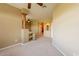 Living room showcasing an open floor plan with a unique fireplace column and neutral-toned walls at 11500 E Cochise Dr # 2088, Scottsdale, AZ 85259