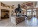 Inviting lobby with artistic statue, stone accents, and elegant seating arrangements at 11500 E Cochise Dr # 2088, Scottsdale, AZ 85259