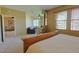 Spacious main bedroom boasts sitting area, natural light, and seamless transition to adjoining spaces at 11500 E Cochise Dr # 2088, Scottsdale, AZ 85259