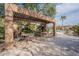Relaxing poolside patio featuring shaded seating, lush landscaping, and a serene atmosphere at 11500 E Cochise Dr # 2088, Scottsdale, AZ 85259
