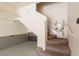 Interior staircase with stair lift assistance, with additional storage and neutral colors at 11500 E Cochise Dr # 2088, Scottsdale, AZ 85259