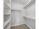 Spacious walk-in closet with shelving and hanging space at 11520 W Lizard Ct, Surprise, AZ 85378