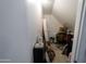 Storage attic with sloped ceiling and various household items stored at 12161 W Flanagan St, Avondale, AZ 85323