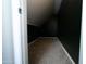 View of the finished attic space, with a carpeted floor and painted walls at 12161 W Flanagan St, Avondale, AZ 85323