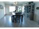 Bright dining room featuring stylish decor, ample natural light, and attractive flooring at 12161 W Flanagan St, Avondale, AZ 85323