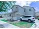 Exterior showing attached garage and driveway with a white car at 12161 W Flanagan St, Avondale, AZ 85323