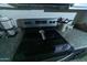 Close-up of a sleek stovetop with modern appliances and stylish kitchen accessories at 12161 W Flanagan St, Avondale, AZ 85323