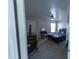 Cozy primary bedroom featuring a ceiling fan, comfortable bed, and a vanity area at 12161 W Flanagan St, Avondale, AZ 85323