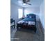 Primary bedroom with a ceiling fan and tasteful decor, creating a relaxing atmosphere at 12161 W Flanagan St, Avondale, AZ 85323